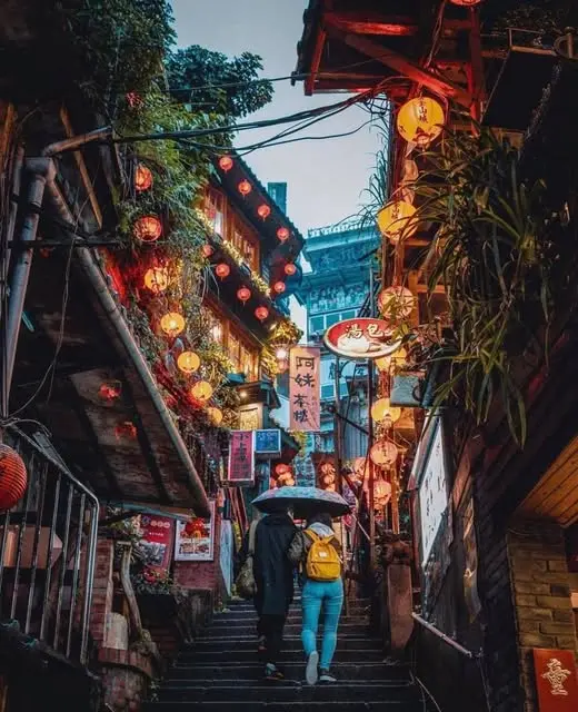 Jiufen Old Street Taiwan — lanterns and winding stairs Spirited Away spirit town food stalls