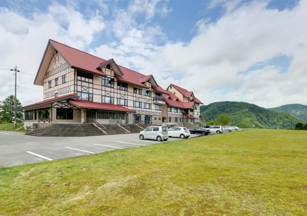 Hotel Amanogawa exterior on Shirabiso Highlands — Southern Alps panorama Nagano Japan