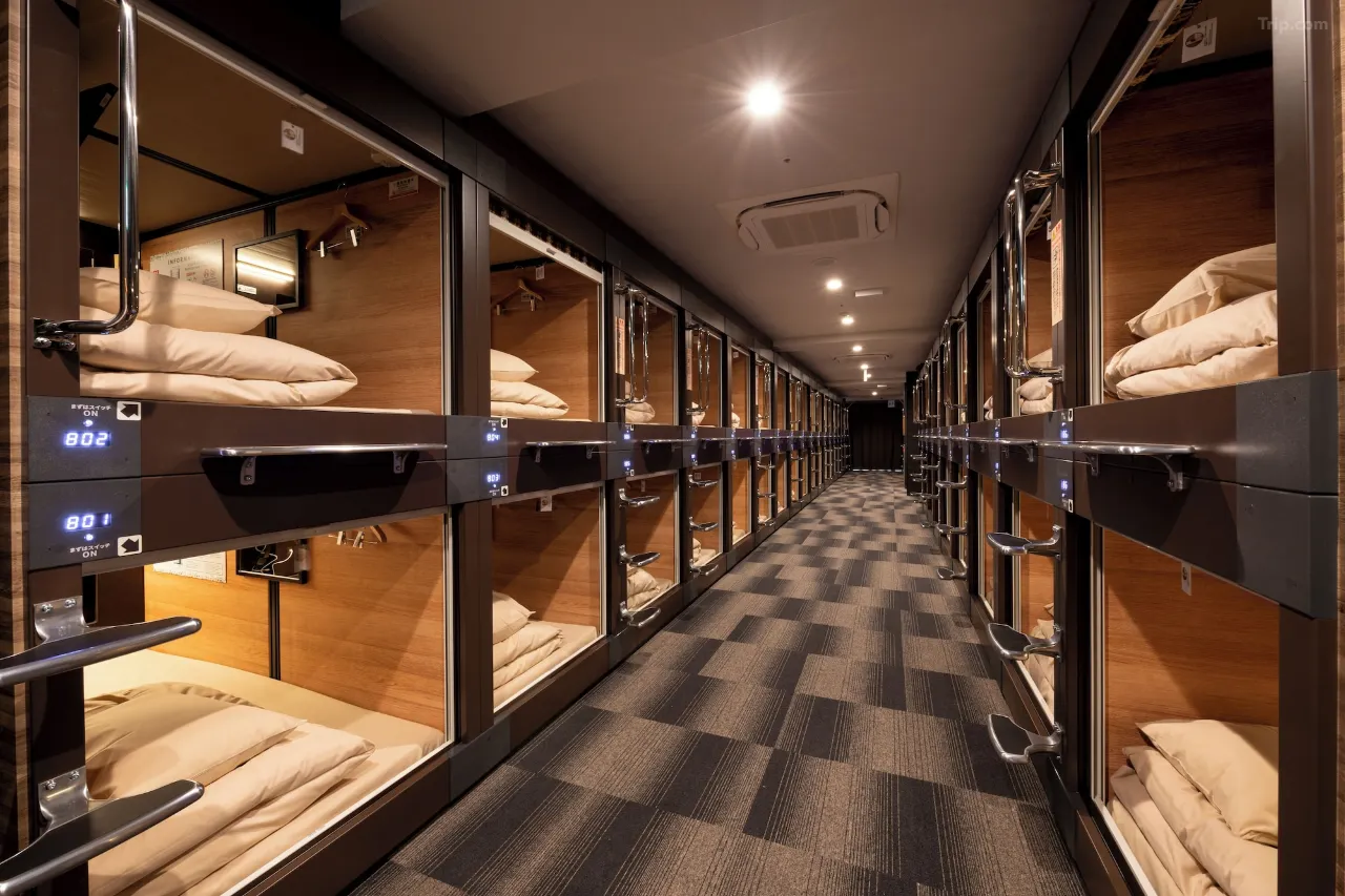 Anshin Oyado Nagoya capsule room — private, TV-equipped with personal safe and USB charging