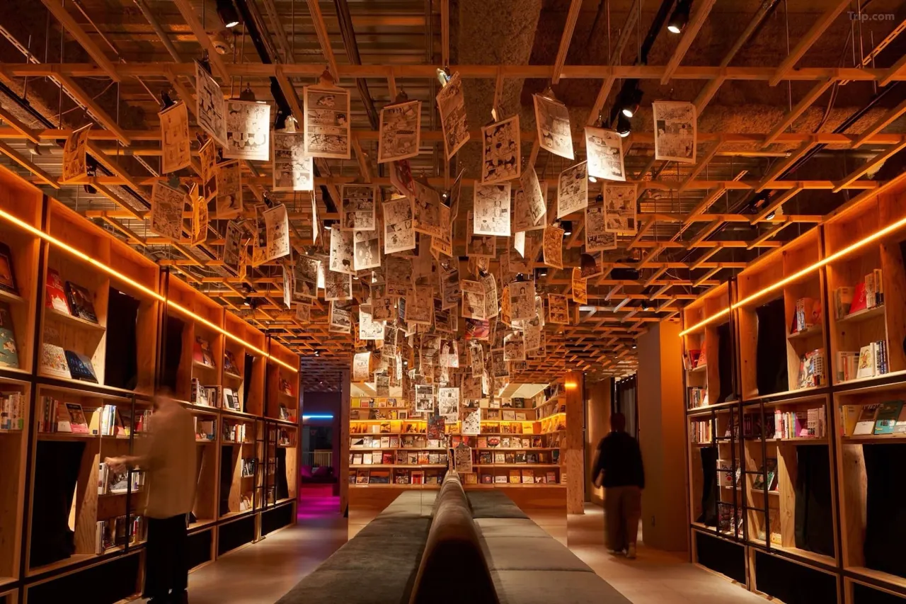 Book and Bed Tokyo Shinjuku — beds tucked inside floor-to-ceiling bookshelves