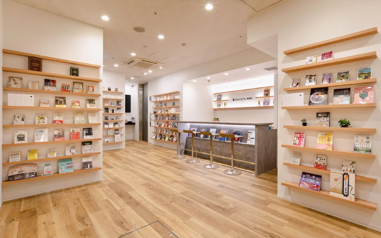 Book Hotel Jimbocho — book-themed floor hallways with genre-curated shelves