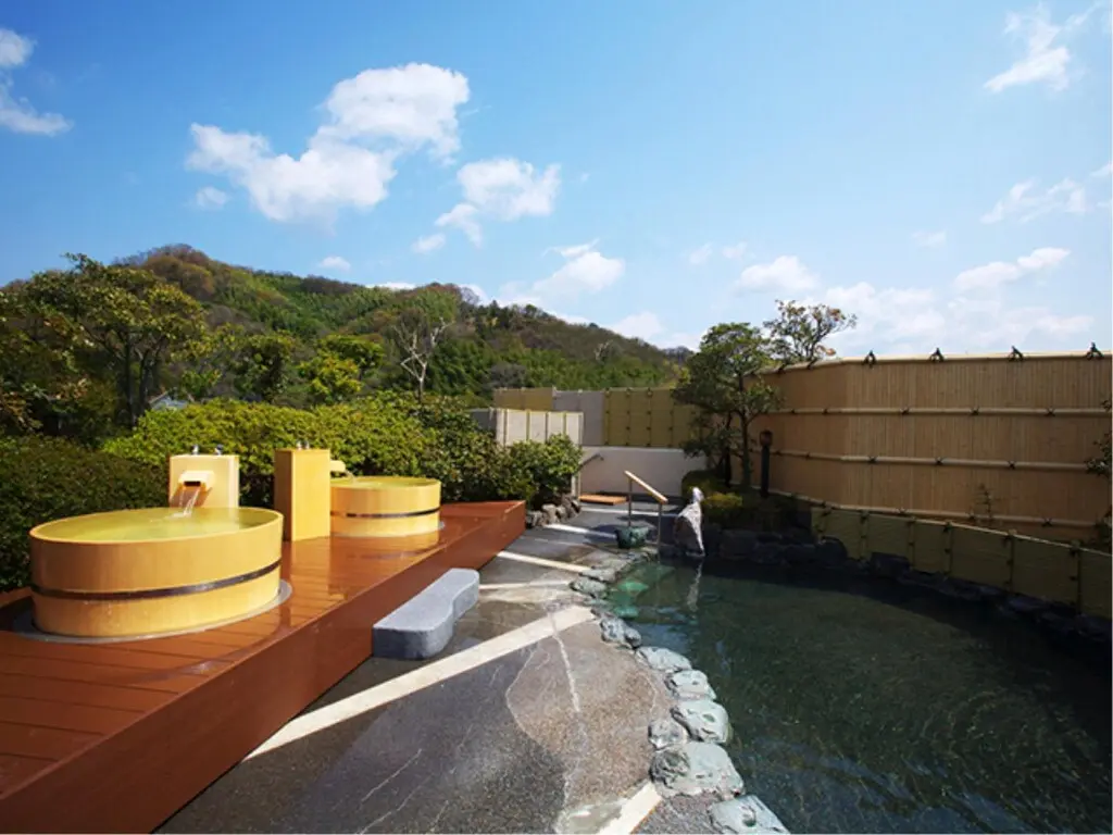 Chaharu rooftop open-air bath — Hoshi no Yu with views of Matsuyama Castle