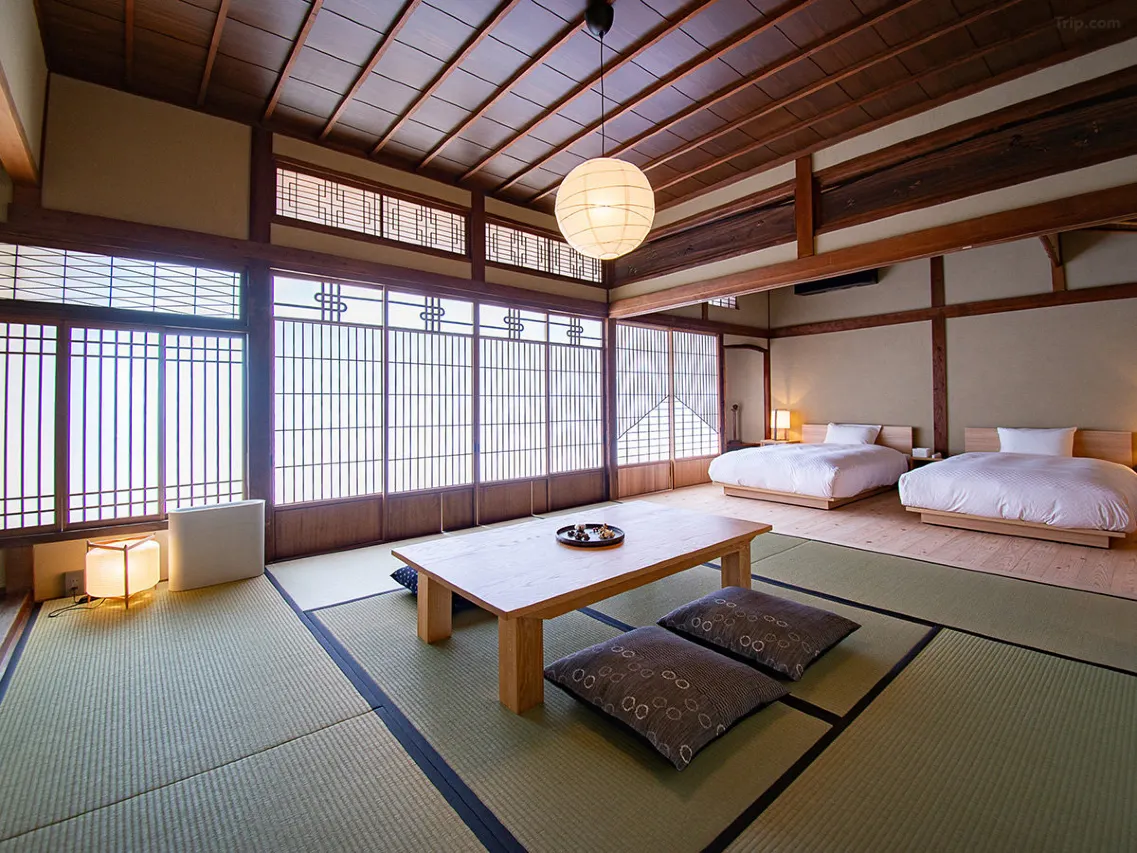 Hotel Cultia Dazaifu guest room — traditional tatami, handcrafted hinoki cypress bathtub, original Meiji-era architecture