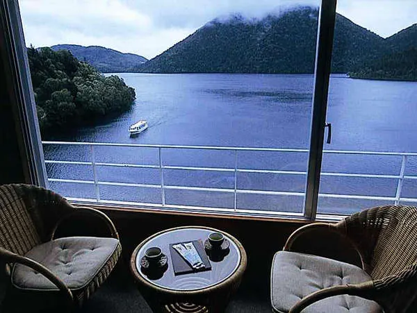 Hotel Fusui tatami room with lake view — Lake Shikaribetsu visible from window