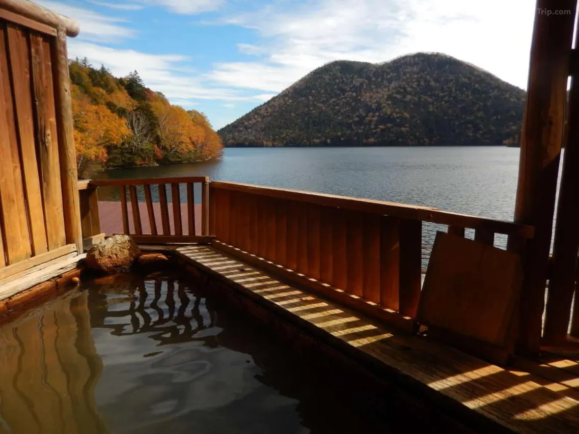 Hotel Fusui open-air rotenburo onsen at lake edge — iron spring bath Hokkaido