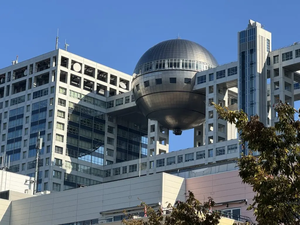 View from Grand Nikko Tokyo Daiba toward Fuji TV building and titanium sphere — Death Note Sakura TV visual match location