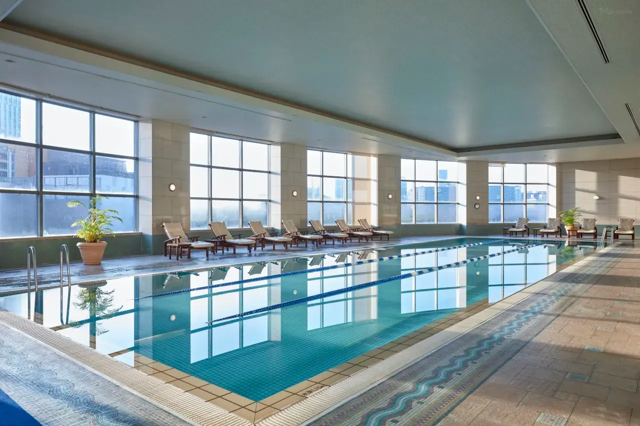 Grand Nikko Tokyo Daiba — indoor pool GRAND BLUE with big glass windows around and city and bay view