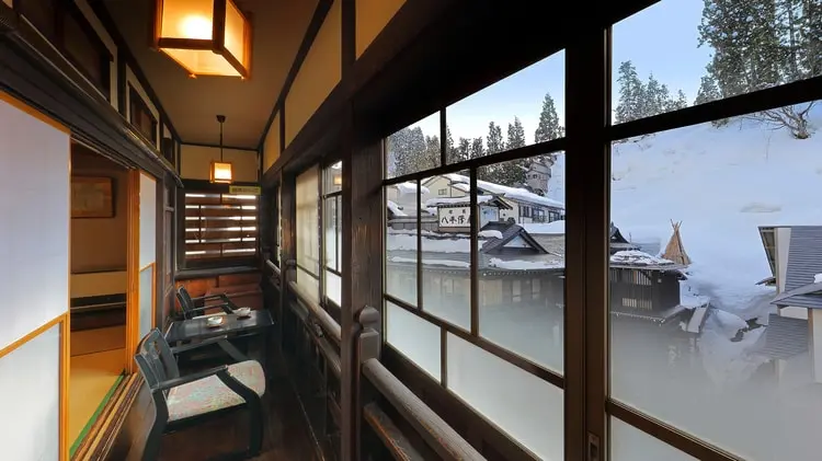 Traditional tatami room at Kosekiya Annex with river view, Ginzan Onsen