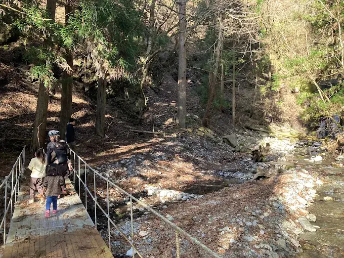 Shimotsuki Matsuri in Toyama-go valley — masked gods around sacred cauldron, the December festival that inspired Spirited Away