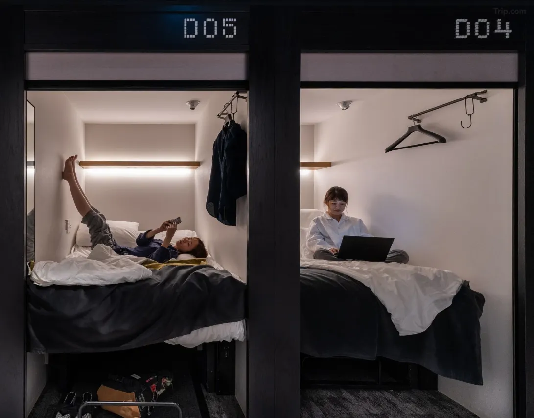 The Millennials Shibuya Smart Pod interior with reclining bed and iPod controls