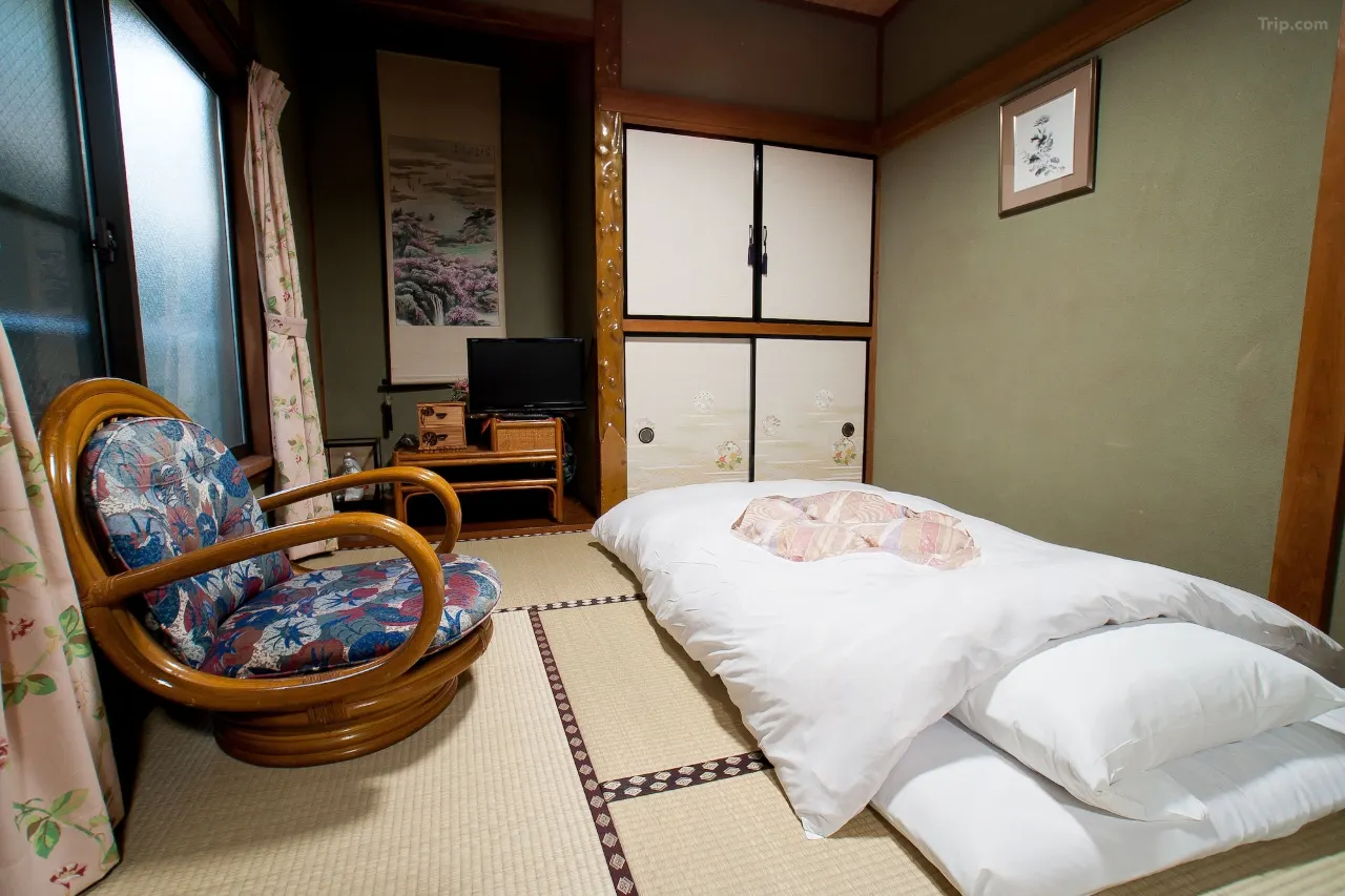 14-mat tatami suite with fusuma painted sliding doors at Ryokan Niko