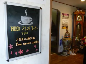 Cafe Niko ground floor at Ryokan Niko — analog record player and local neighbourhood atmosphere