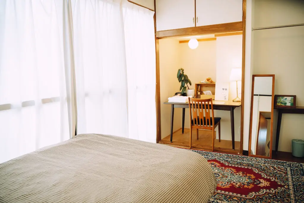 Train Room at Yado Popeye — private double room with terrace directly overlooking Iyo-Kaminada Station platform Ehime