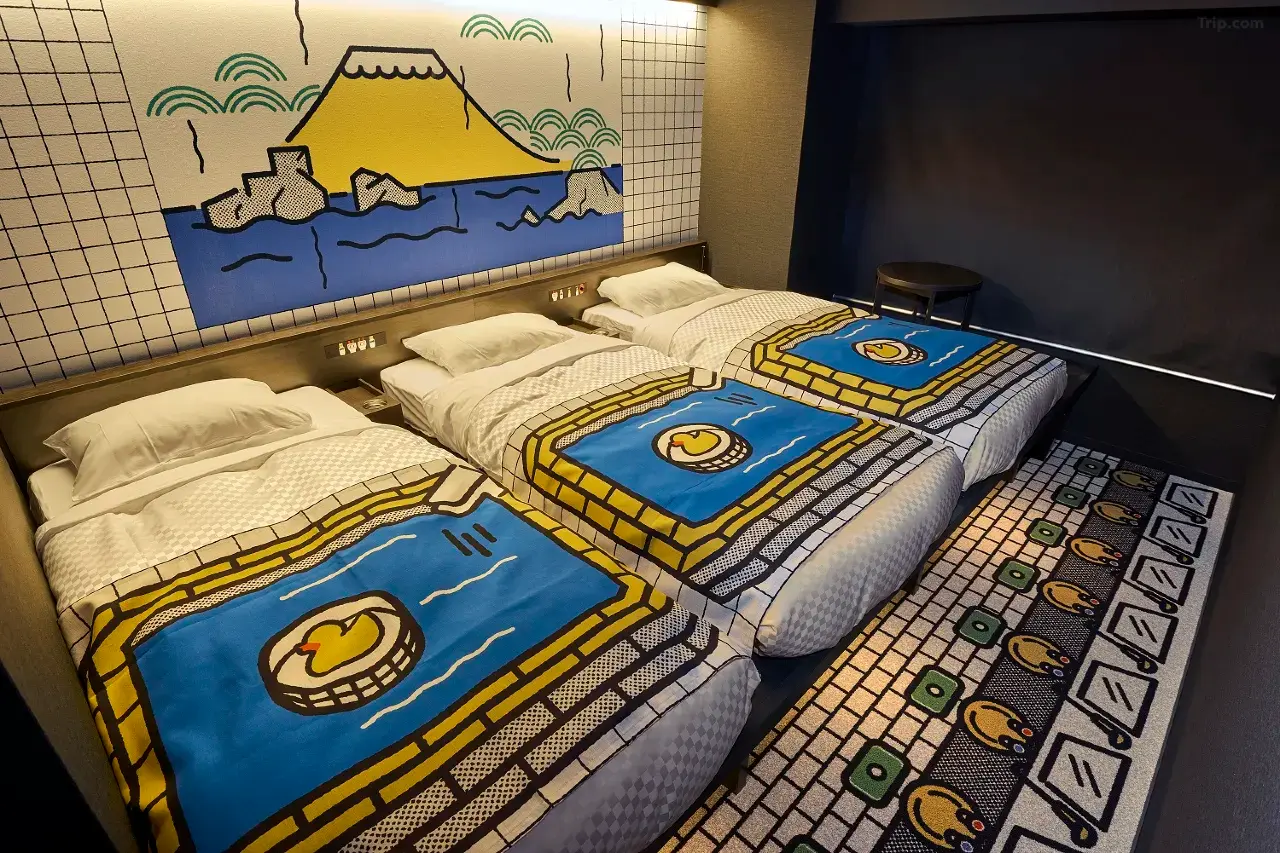 Hotel Tavinos Kyoto manga-themed room — sumo, public bath or moon-viewing design, Magniflex mattress