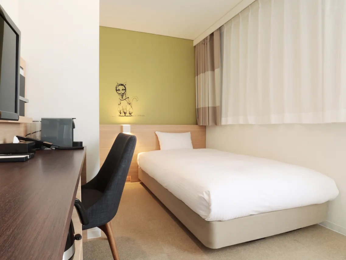 Private room at WeBase Takamatsu with modern amenities